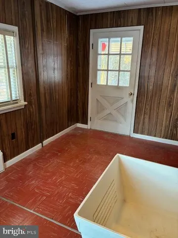 a front view of a house with yard