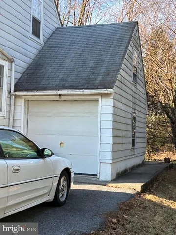 a view of a livingroom with furniture and front door