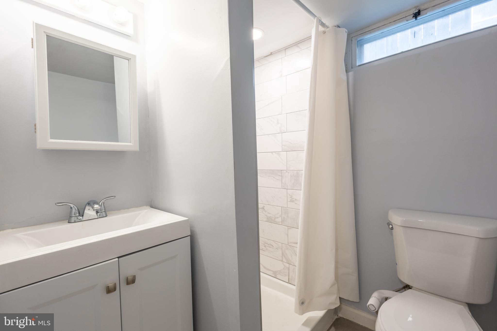 5532 B Street Southeast Washington, DC 20019 - Photo 19 of 19 a bathroom with a sink toilet and vanity