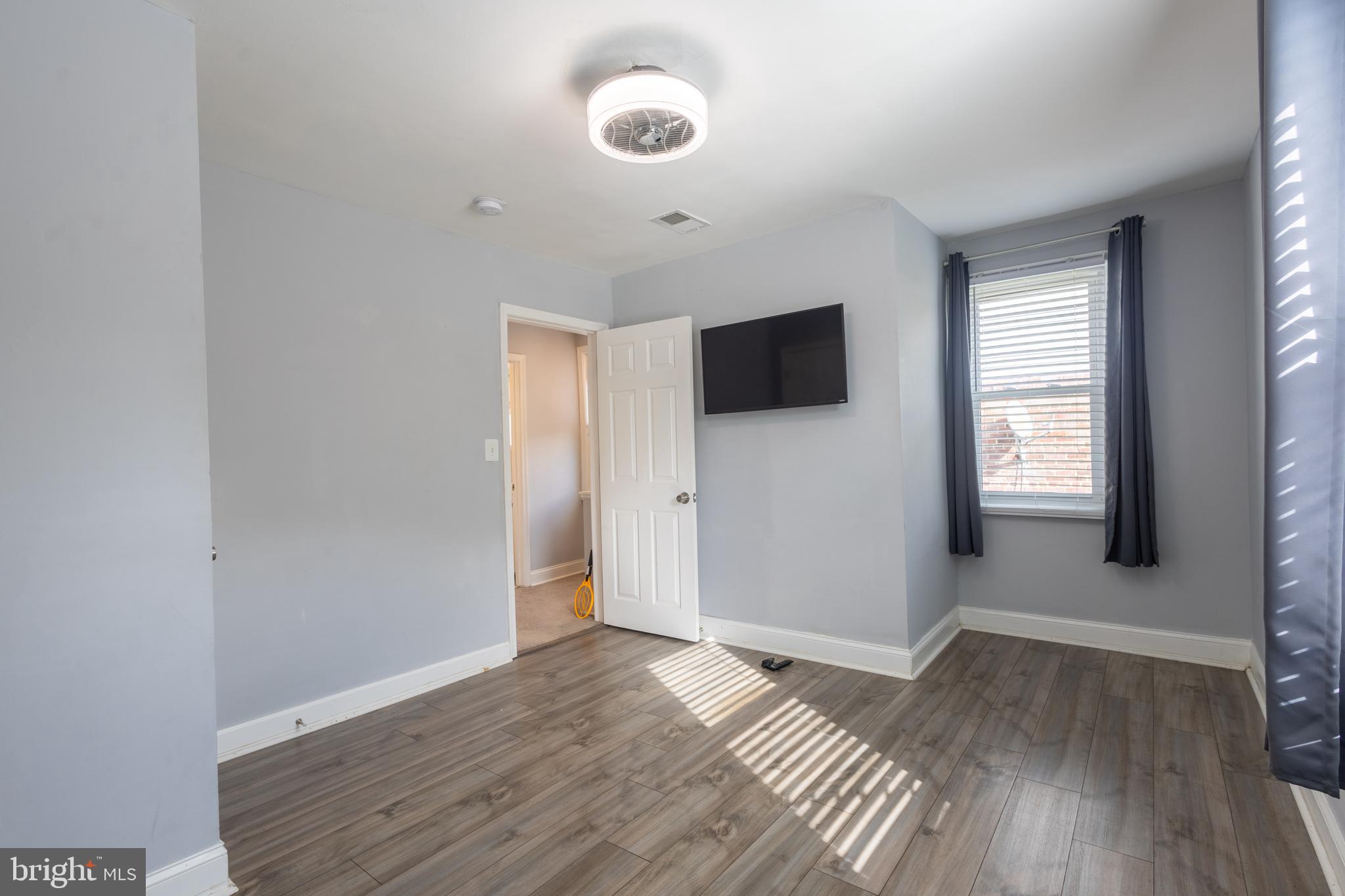 5532 B Street Southeast Washington, DC 20019 - Photo 2 of 19 a view of a livingroom with wooden floor