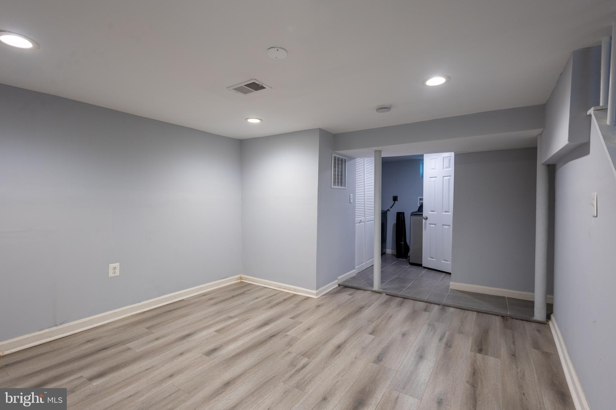 5532 B Street Southeast Washington, DC 20019 - Photo 8 of 19 a view of an empty room with wooden floor and closet