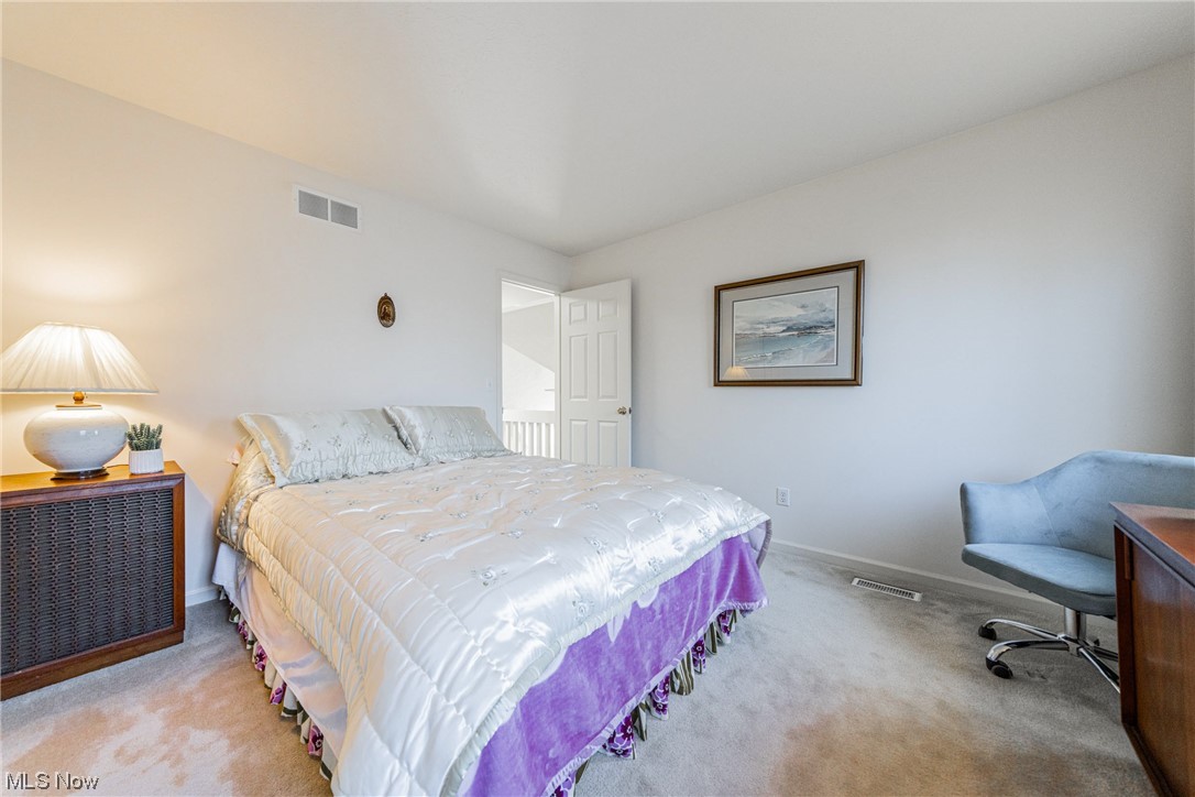 4220 Castle Ridge Akron, OH 44321 - Photo 21 of 35 Bedroom featuring light colored carpet