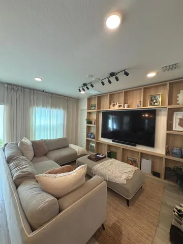 an aerial view of a city with ocean view