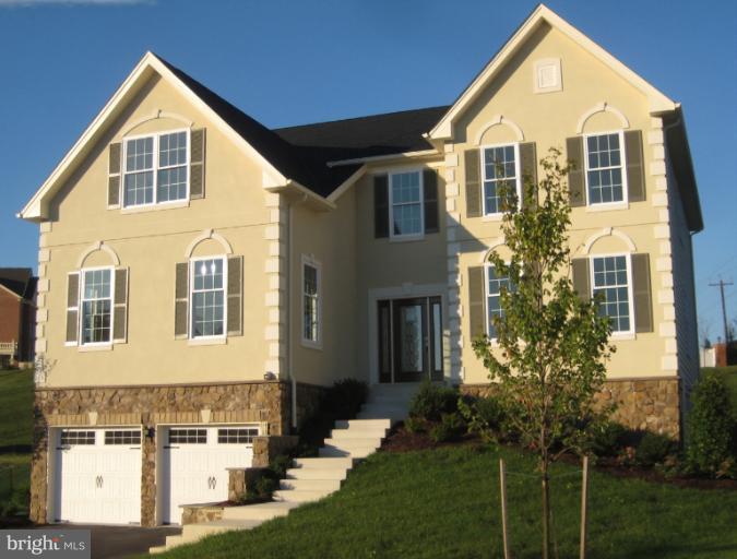 11103 Rodeo Court Upper Marlboro, MD 20772 - Photo 1 of 15 a front view of a house with a yard
