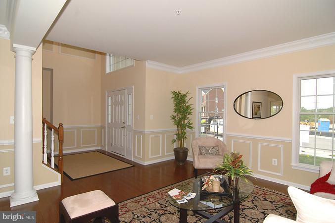 11103 Rodeo Court Upper Marlboro, MD 20772 - Photo 4 of 15 a living room with furniture and a window