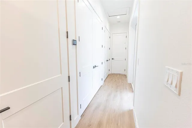 a view of a house with sitting area and garden