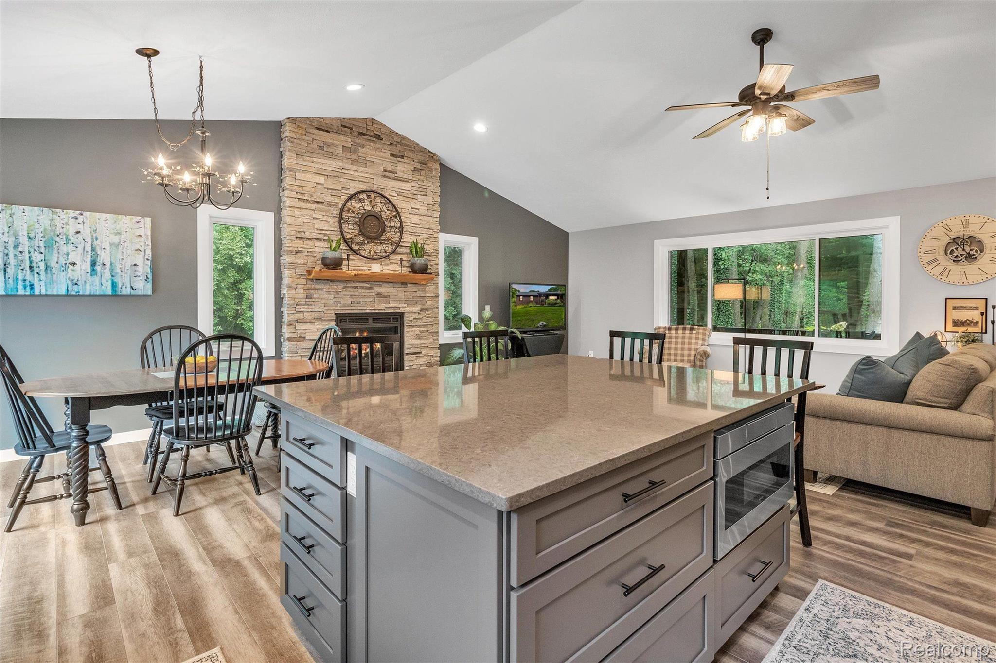 1744 Peavy Road Howell, MI 48843 - Photo 11 of 34 Enjoy the gas fireplace with new stone surround.