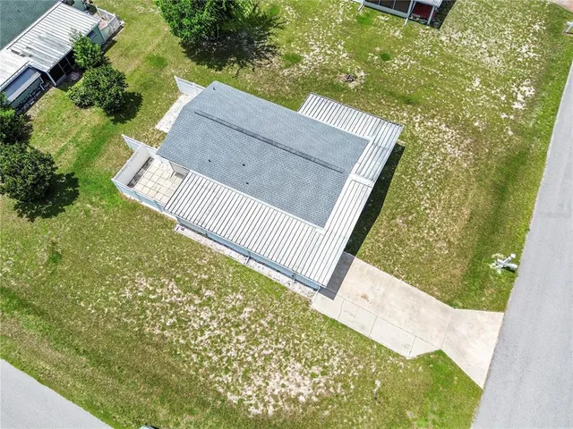 a view of backyard with green space
