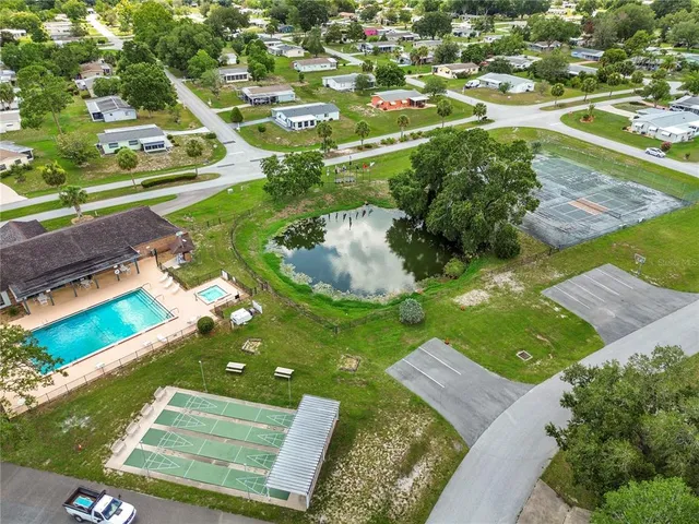 a view of a golf course with street