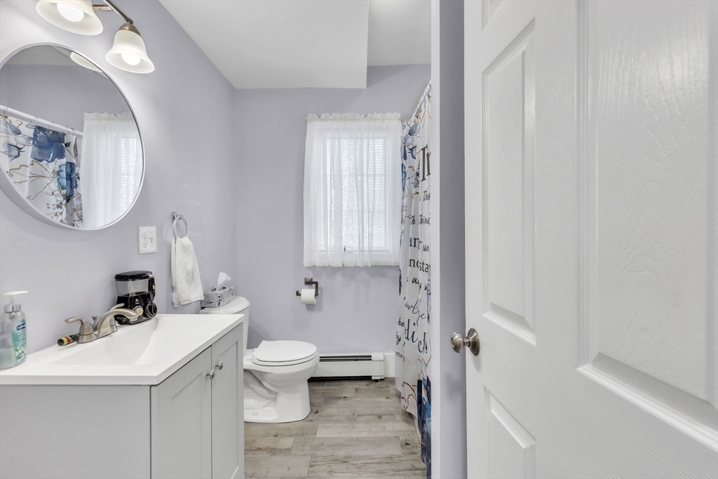 253-255 Oak Street Springfield, MA 01151 - Photo 20 of 30 a bathroom with a sink toilet and shower