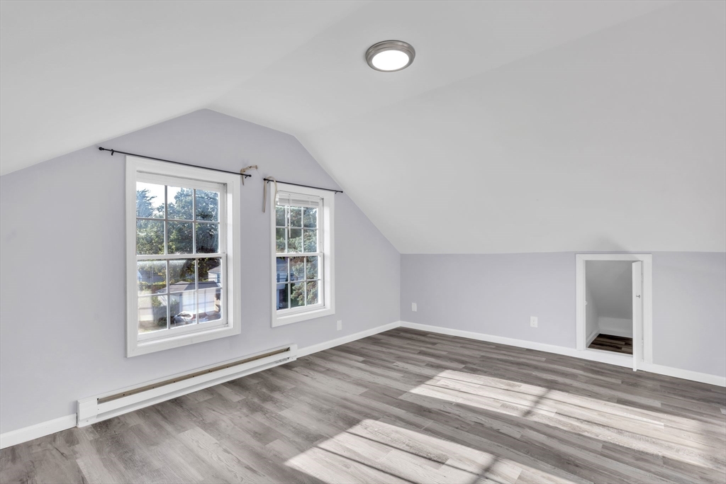253-255 Oak Street Springfield, MA 01151 - Photo 21 of 30 a view of an empty room with a window