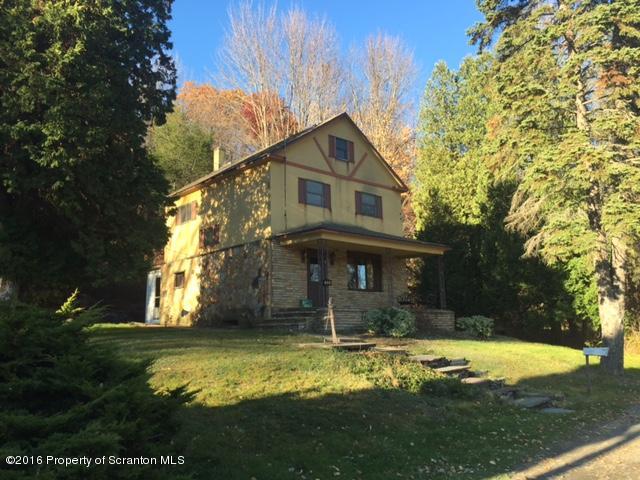 1889 Whites Ferry Road Falls, PA 18615 - Photo 1 of 23 a front view of a house with swimming pool