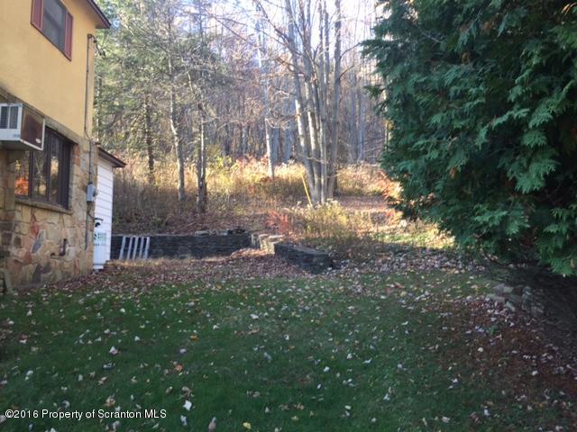 1889 Whites Ferry Road Falls, PA 18615 - Photo 13 of 23 a view of backyard with green space