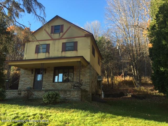 1889 Whites Ferry Road Falls, PA 18615 - Photo 2 of 23 a front view of a house with a yard