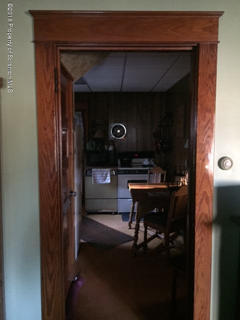1889 Whites Ferry Road Falls, PA 18615 - Photo 6 of 23 a bench sitting in front of a door