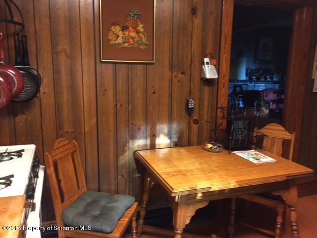 1889 Whites Ferry Road Falls, PA 18615 - Photo 7 of 23 a dining room with furniture and wooden floor