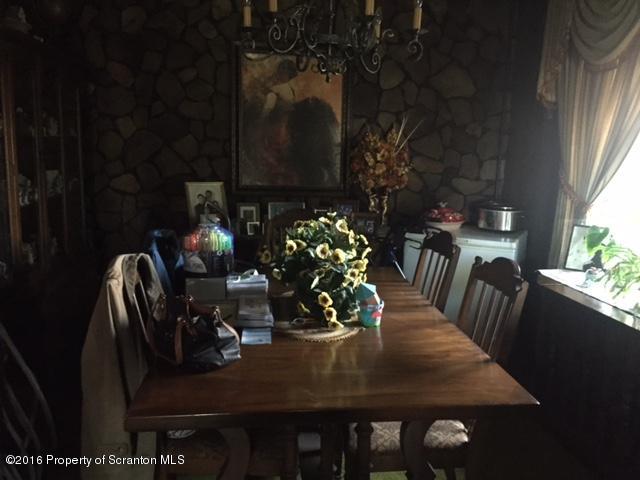 1889 Whites Ferry Road Falls, PA 18615 - Photo 9 of 23 a view of a dining room with furniture and wooden floor