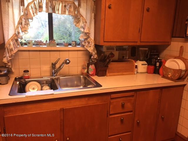 1889 Whites Ferry Road Falls, PA 18615 - Photo 10 of 23 a kitchen with a sink and a window