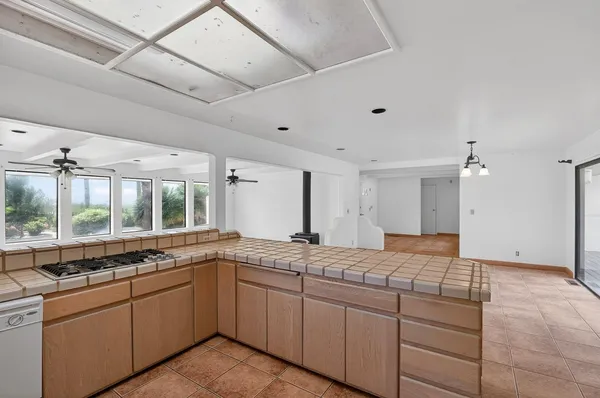 a bathroom with a sink a vanity and a mirror