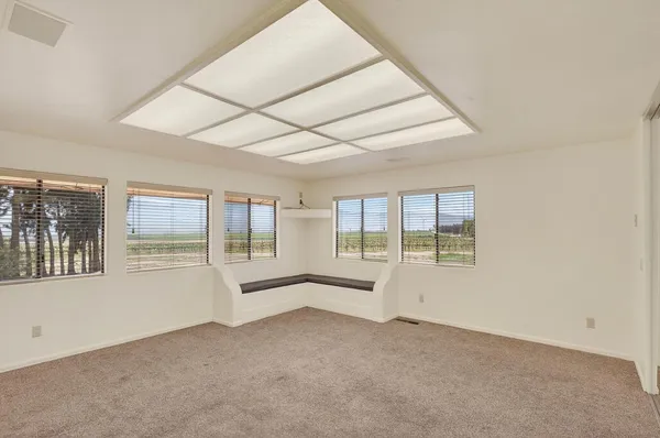 an empty room with windows