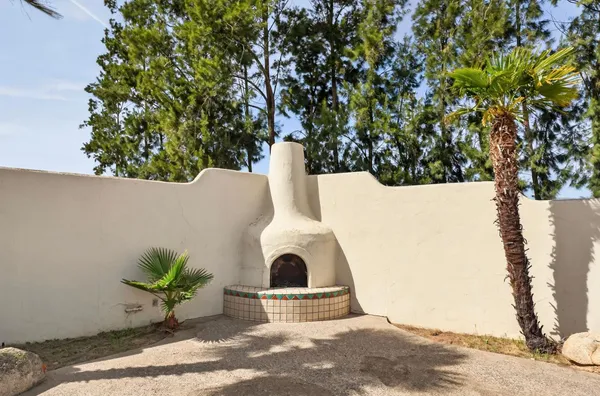 a view of a chairs and table in the room
