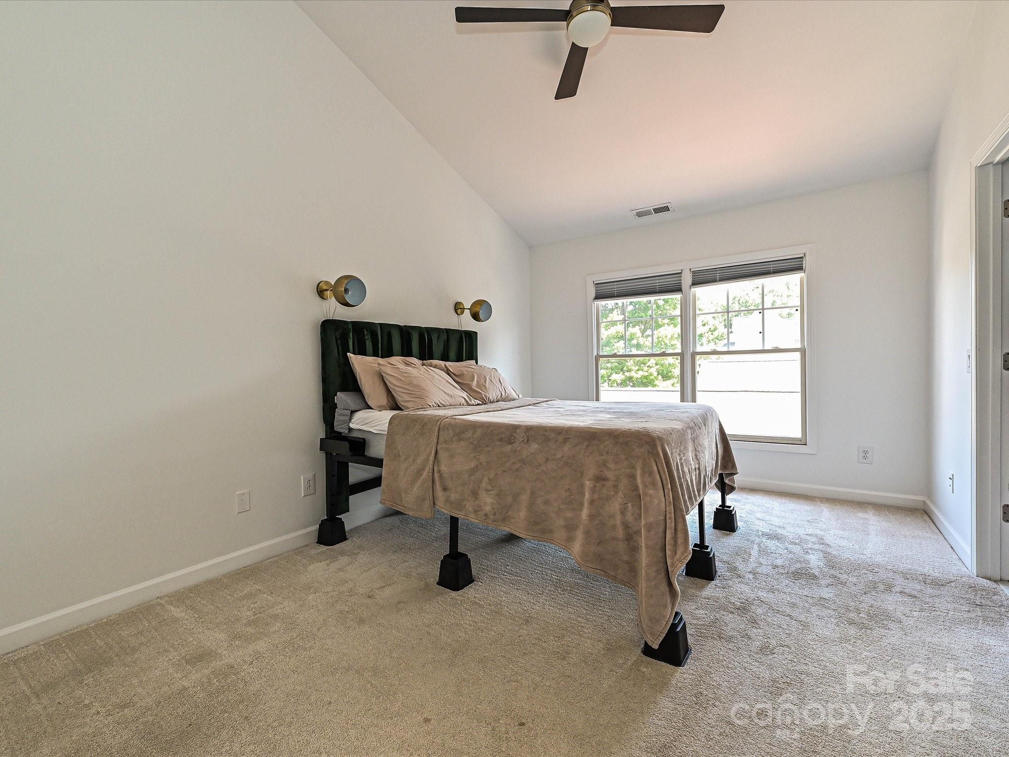 1035 Market Street Fort Mill, SC 29708 - Photo 17 of 28 a bed room with a bed and a window