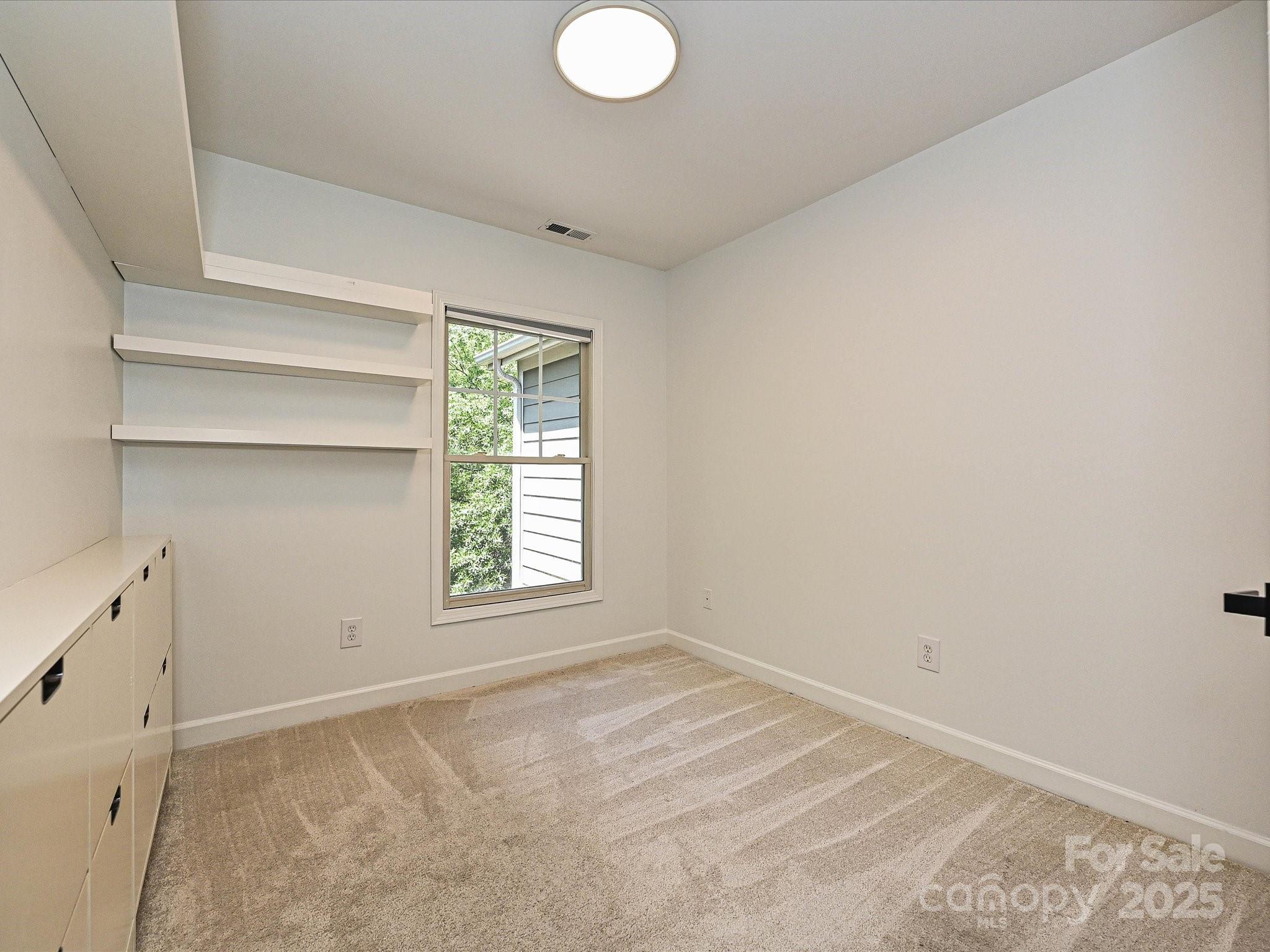 1035 Market Street Fort Mill, SC 29708 - Photo 23 of 28 a view of a room that has a window in it