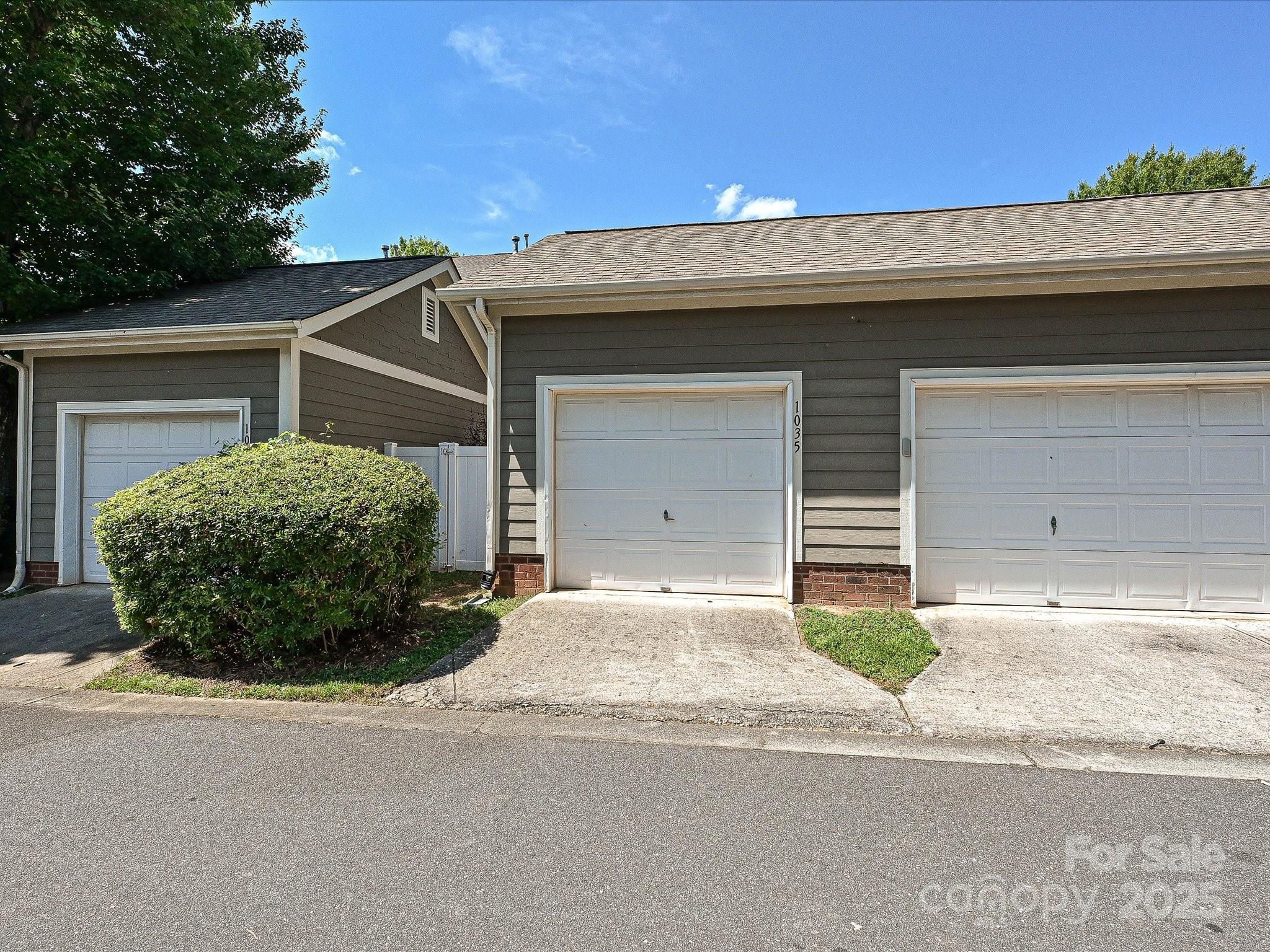 1035 Market Street Fort Mill, SC 29708 - Photo 27 of 28 a view of a house with a yard and garage