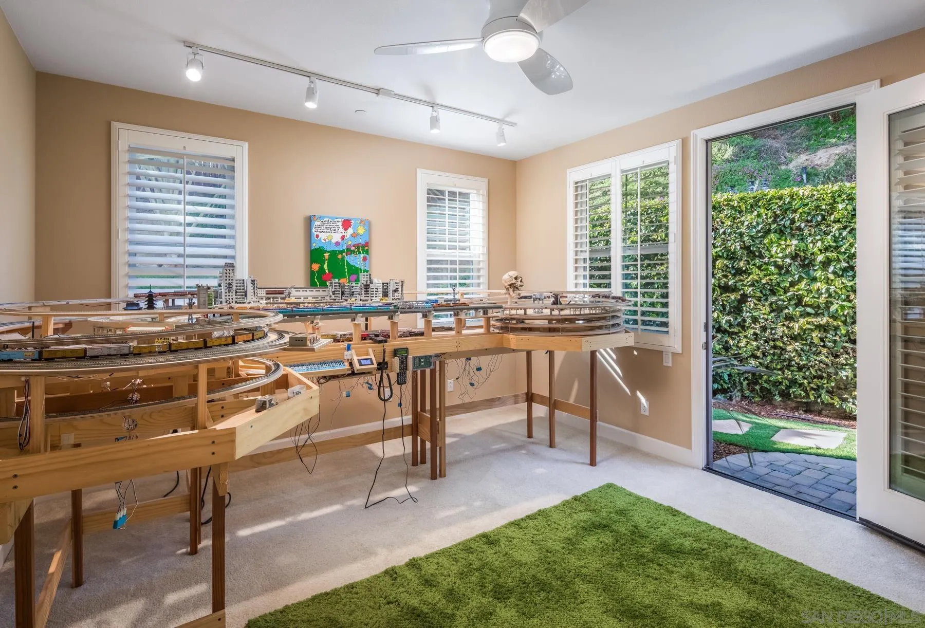 548 Quail Pointe Lane Encinitas, CA 92024 - Photo 14 of 30 a living room with stainless steel appliances kitchen island granite countertop furniture and a open kitchen view