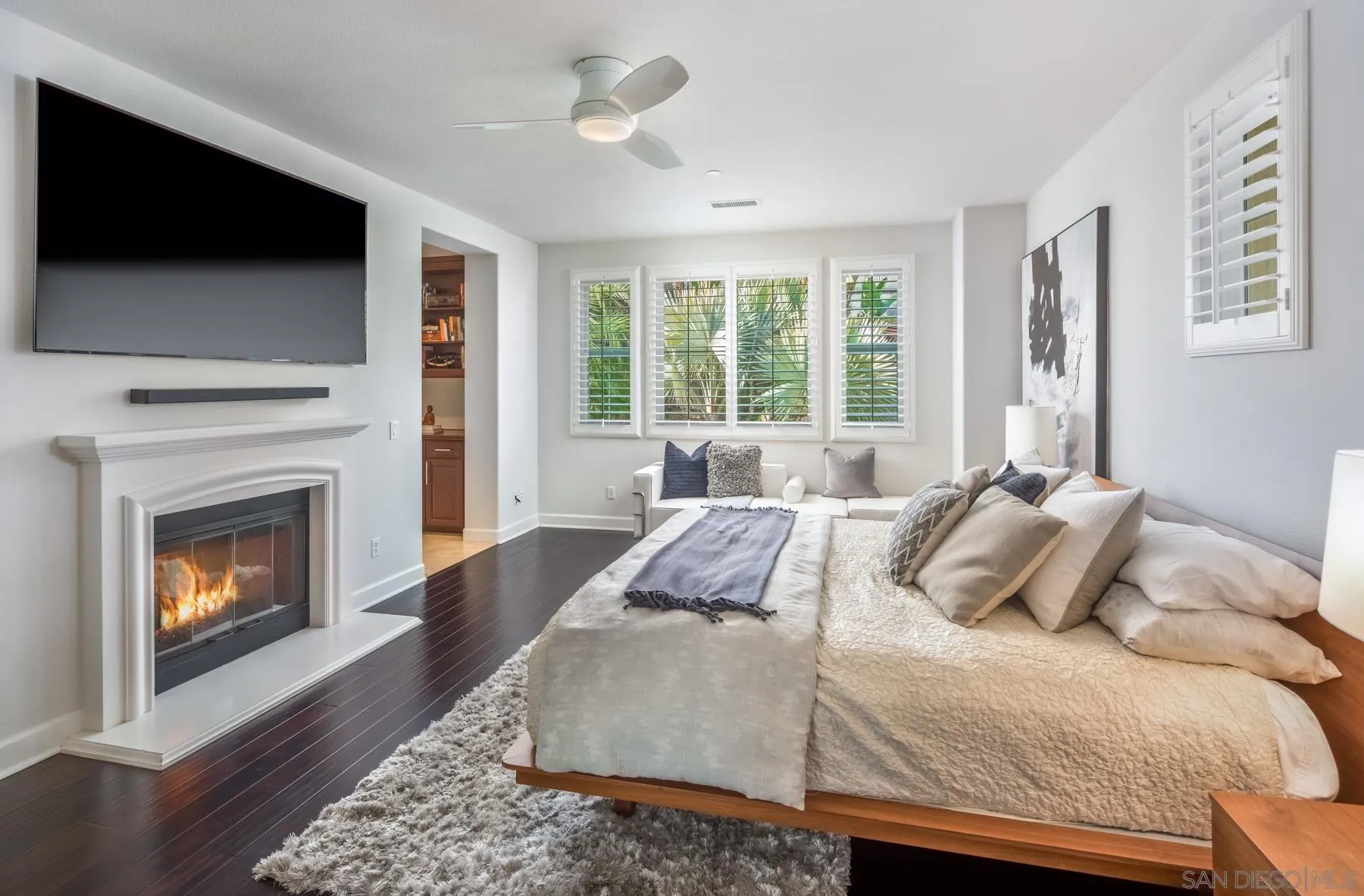 548 Quail Pointe Lane Encinitas, CA 92024 - Photo 16 of 30 a bedroom with a bed and a flat screen tv