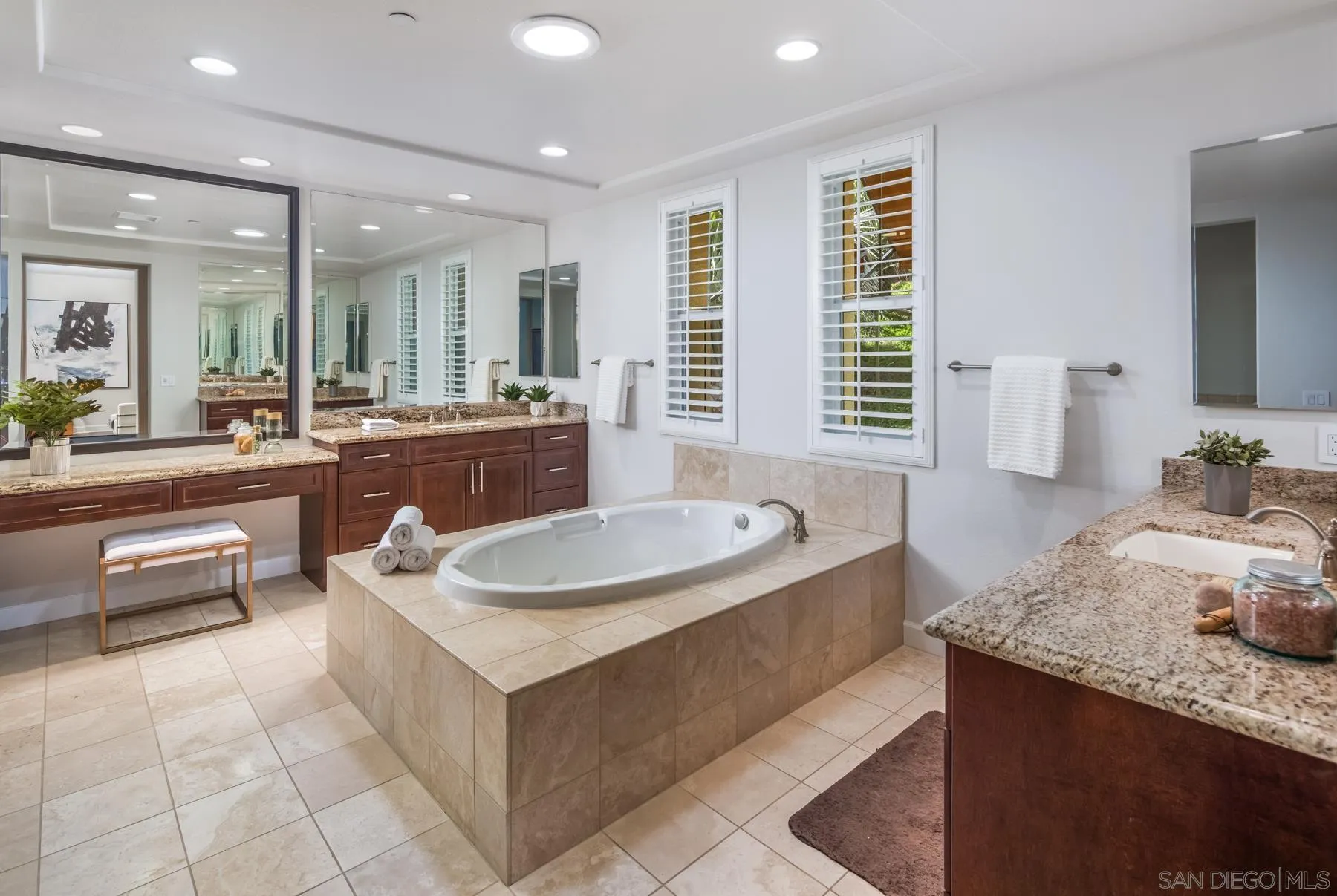 548 Quail Pointe Lane Encinitas, CA 92024 - Photo 18 of 30 a dining hall with stainless steel appliances granite countertop a sink and dishwasher