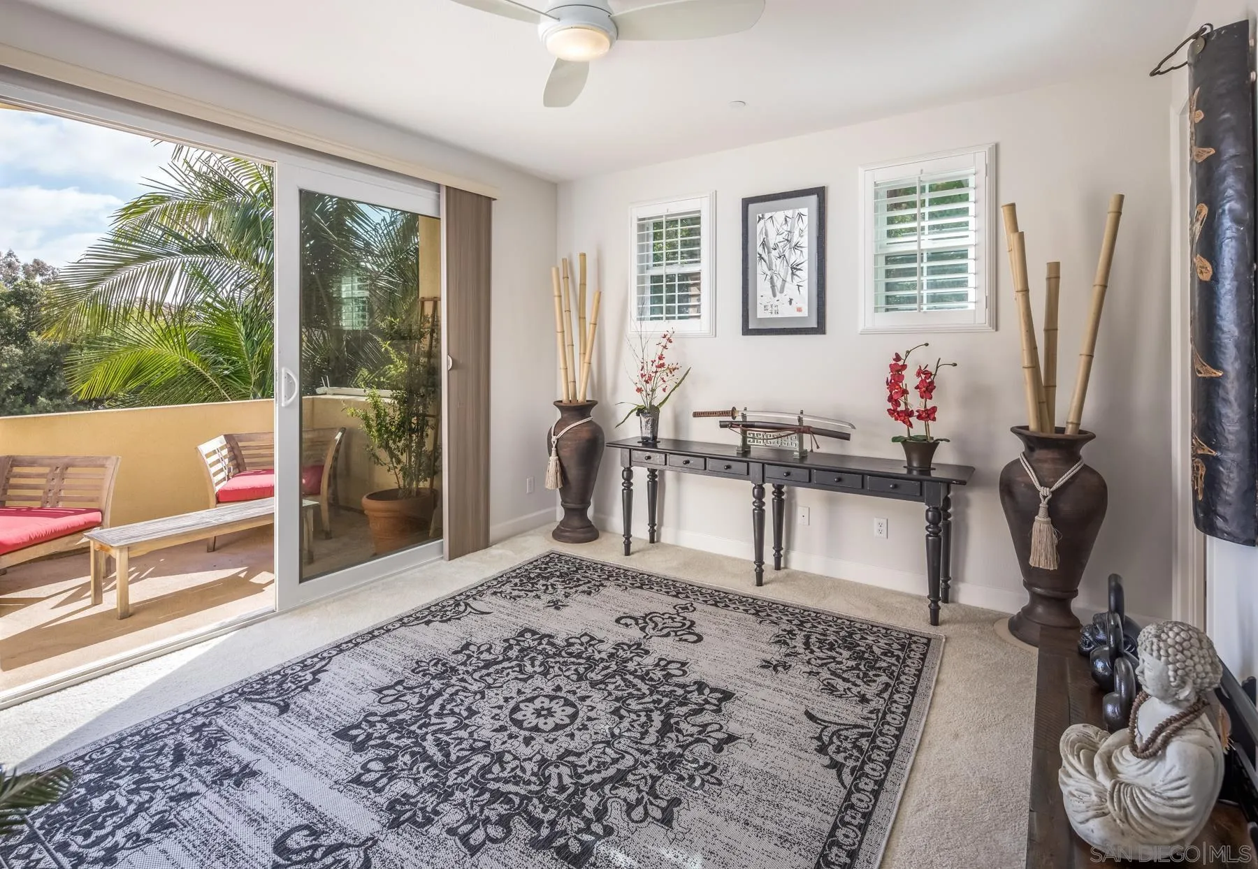 548 Quail Pointe Lane Encinitas, CA 92024 - Photo 20 of 30 a living room with furniture a window and a flat screen tv