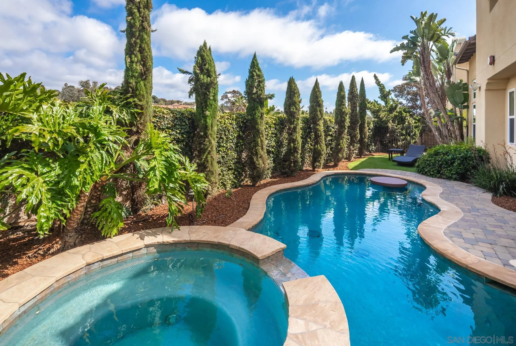 548 Quail Pointe Lane Encinitas, CA 92024 - Photo 23 of 30 a view of a swimming pool with a yard