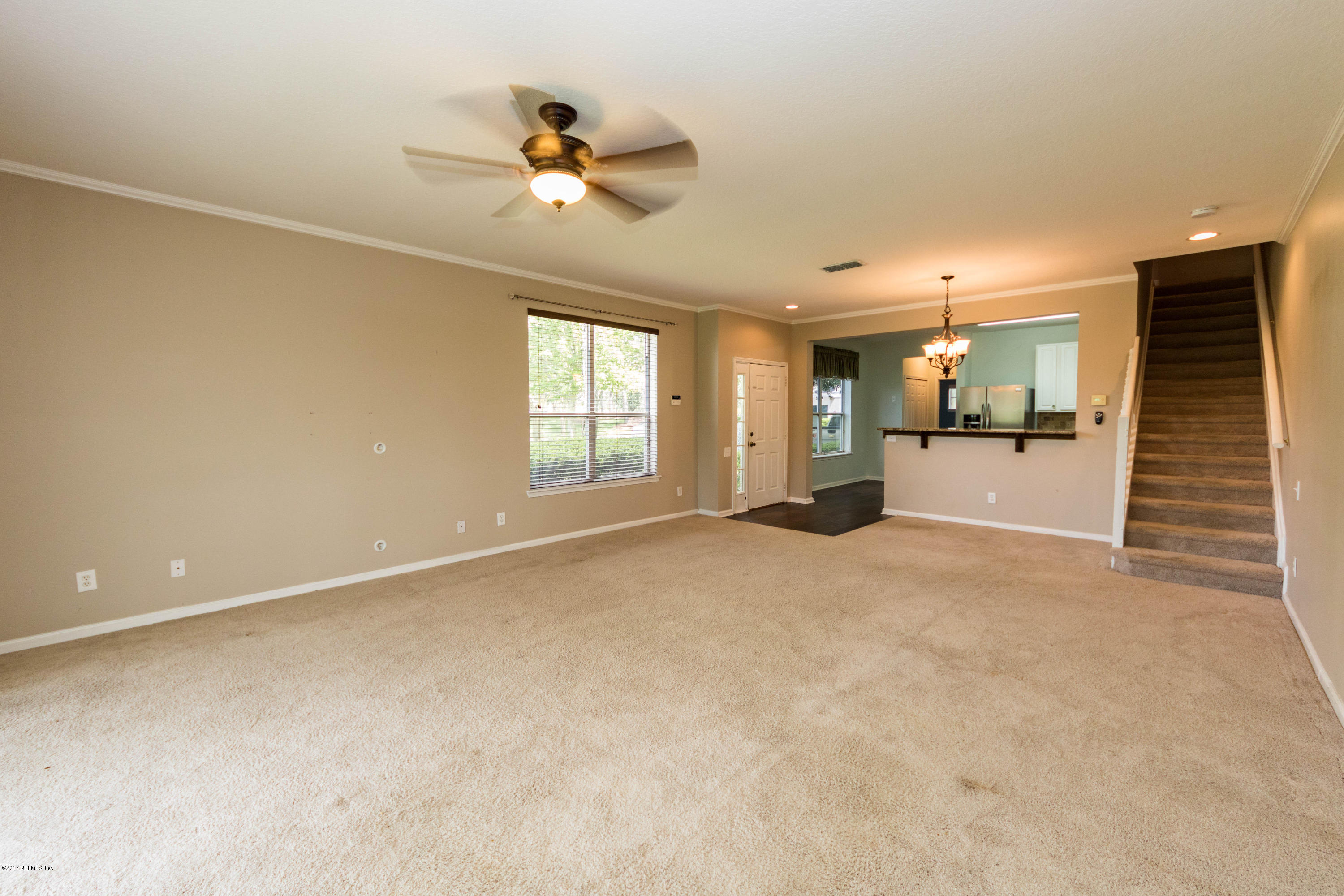 7990 Baymeadows Road East, Unit 1408 Jacksonville, FL 32256 - Photo 16 of 36 a view of an empty room with a window