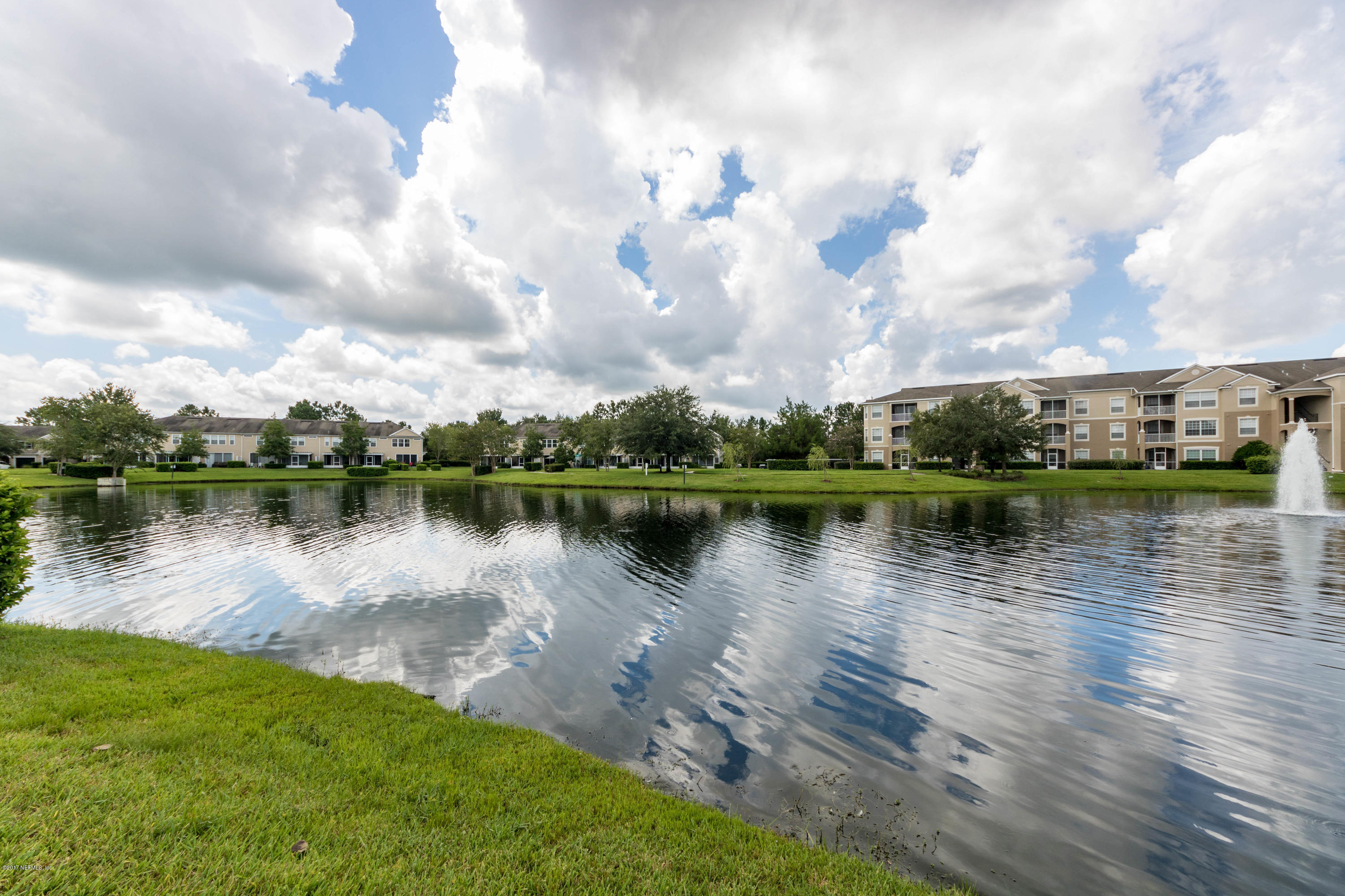 7990 Baymeadows Road East, Unit 1408 Jacksonville, FL 32256 - Photo 19 of 36 a view of a lake