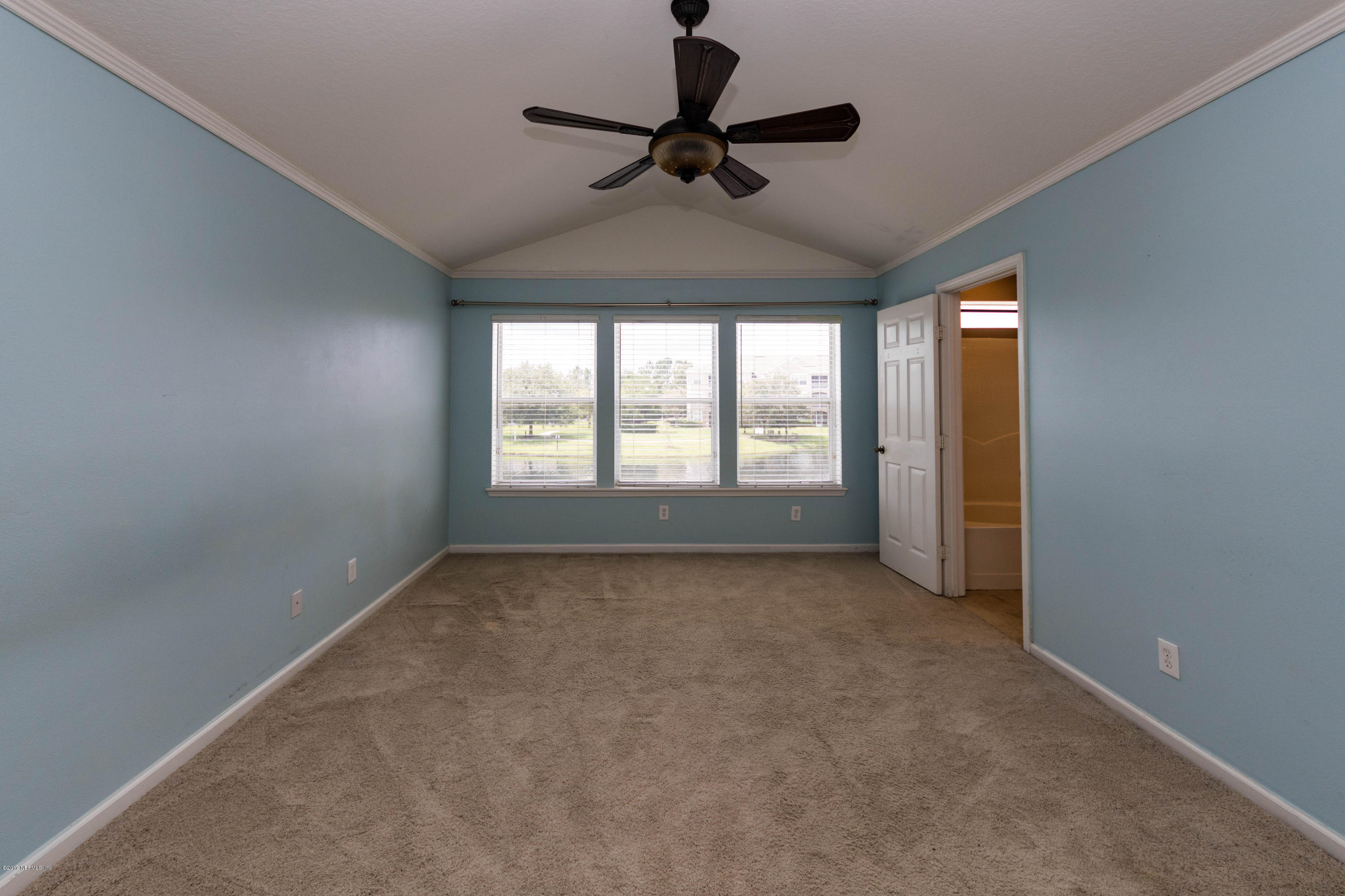 7990 Baymeadows Road East, Unit 1408 Jacksonville, FL 32256 - Photo 22 of 36 a view of an empty room with a window