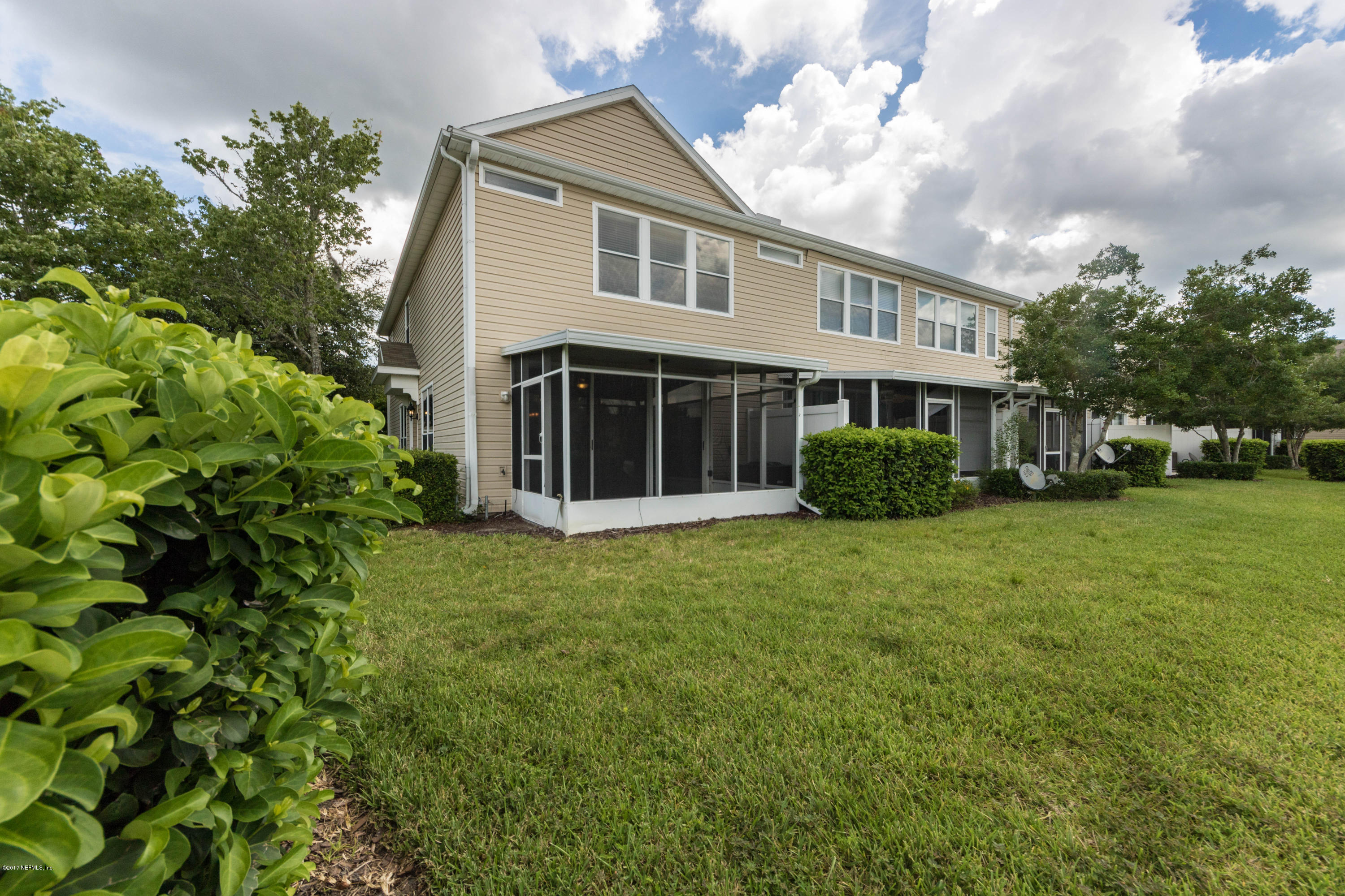 7990 Baymeadows Road East, Unit 1408 Jacksonville, FL 32256 - Photo 36 of 36 a view of a house with a garden