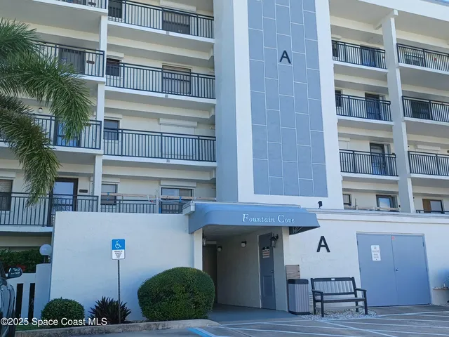 a front view of a building with balcony