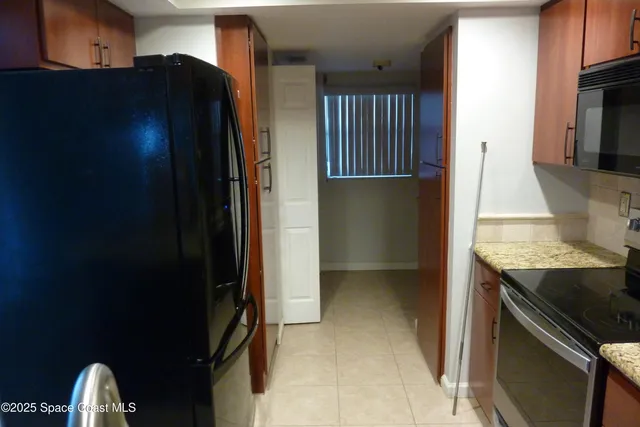 a view of kitchen and utility room