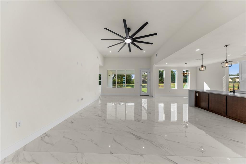 809 Fm 467 Seguin, TX 78155 - Photo 2 of 40 a view of a livingroom with a kitchen