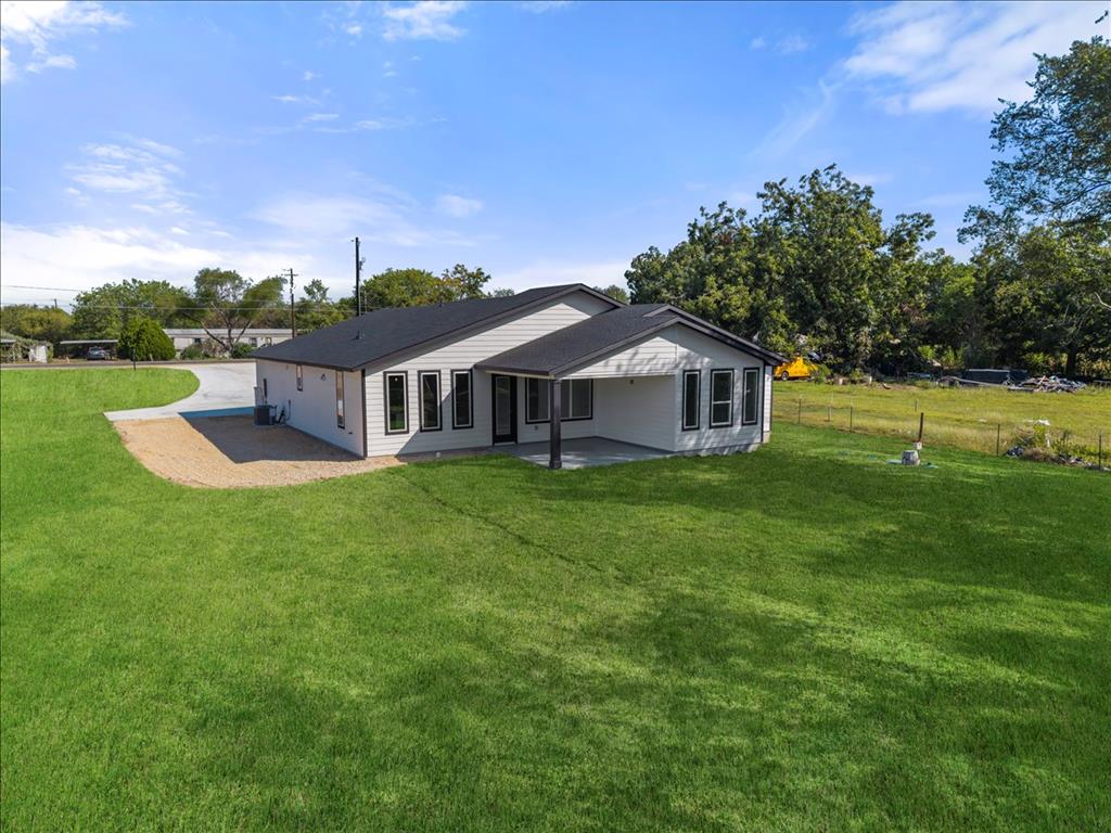 809 Fm 467 Seguin, TX 78155 - Photo 39 of 40 a aerial view of a house with a yard table and chairs