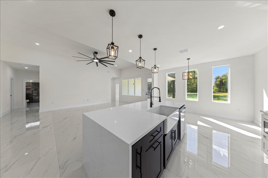 809 Fm 467 Seguin, TX 78155 - Photo 40 of 40 a kitchen with a stove a sink and a refrigerator