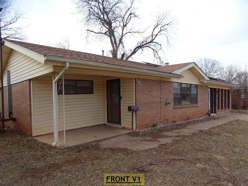 2002 Minter Lane Abilene, TX 79603 - Photo 1 of 16 a view of a house with a yard