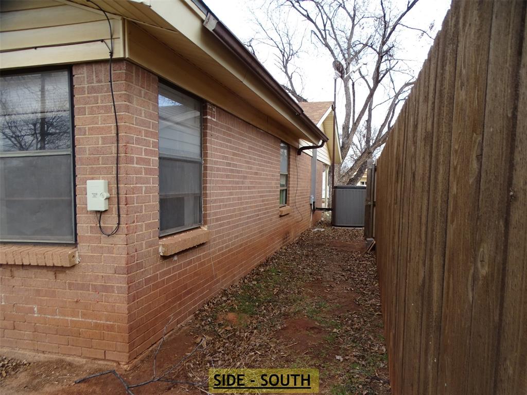 2002 Minter Lane Abilene, TX 79603 - Photo 13 of 16 a view of a backyard of the house