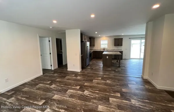 a view of a living room and dining room