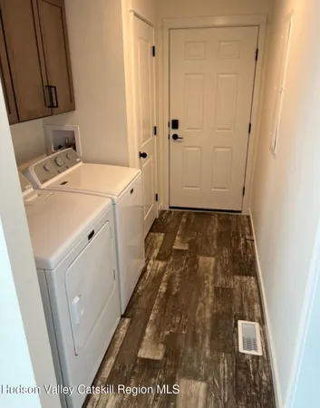 a bathroom with a sink and a shower