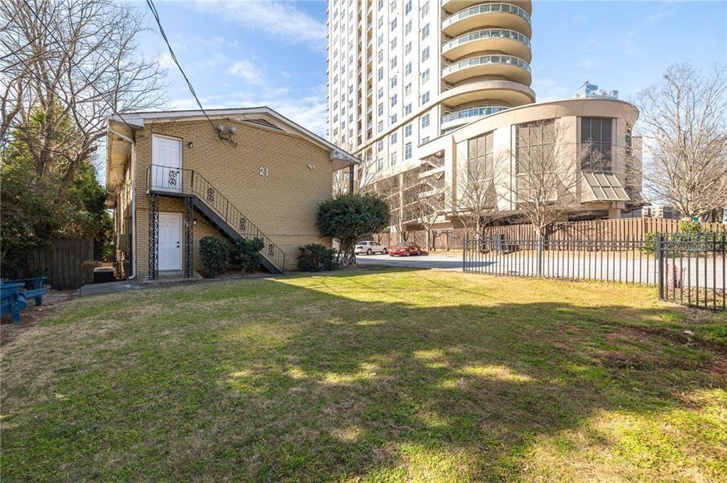 21 Delmont Drive Northeast, Unit 7 Atlanta, GA 30305 - Photo 21 of 22 a view of a house with a swimming pool