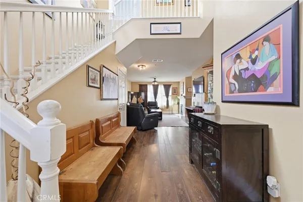 a kitchen with stainless steel appliances a stove a sink and a microwave