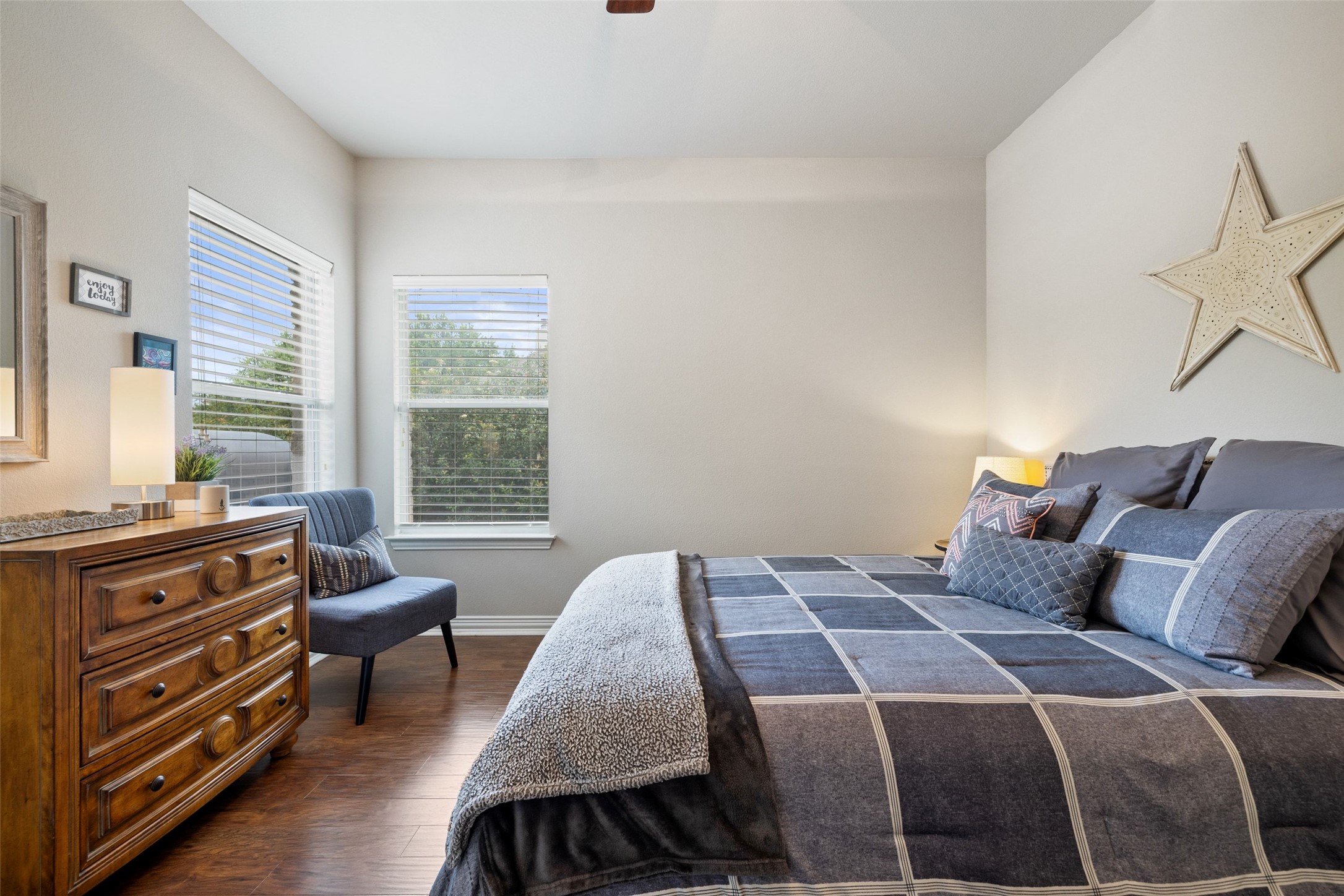 15208 Nightingale Lane Austin, TX 78734 - Photo 23 of 40 Bedroom featuring dark wood-style flooring and ceiling fan