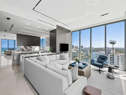 a kitchen with a refrigerator and a sink